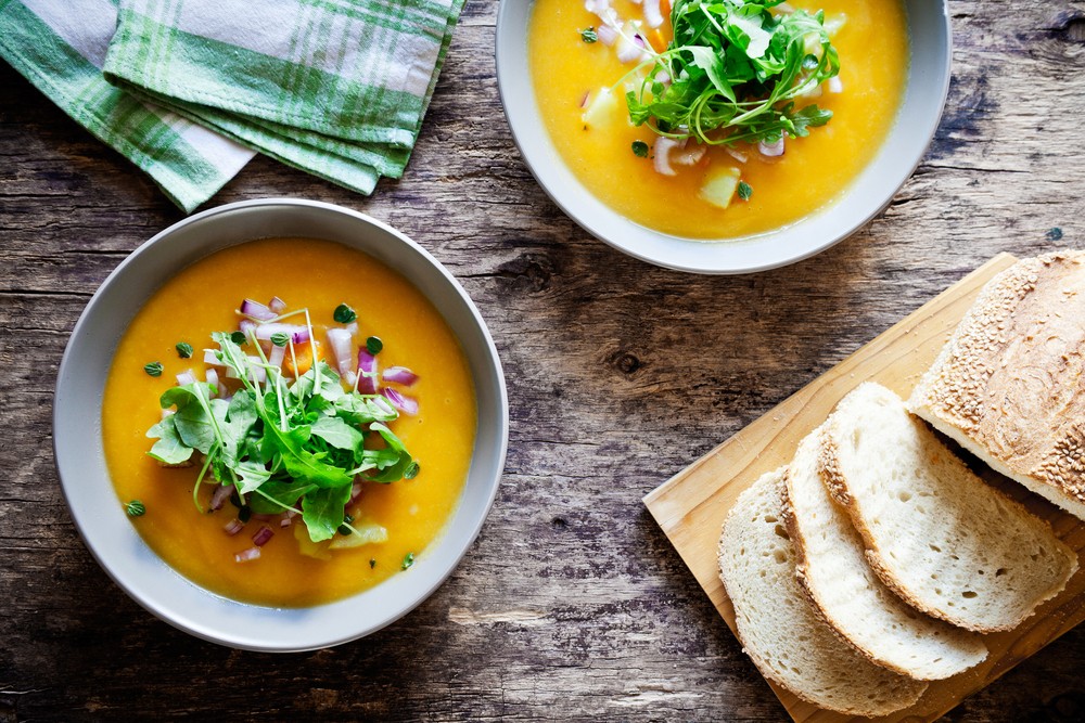 A table full of seasonal soups and stews to keep you warm presented by Gelson's